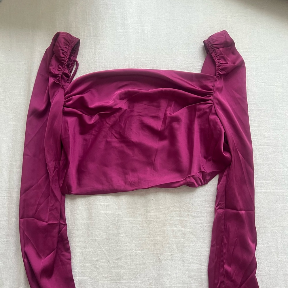 Silk Magenta long sleeve crop top. Open back with strings. NWT